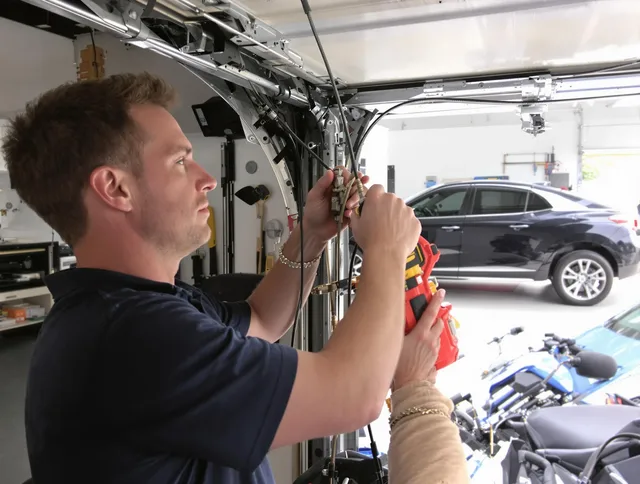 Pasadena Garage Door Repair safety certified technician performing cable replacement in Pasadena