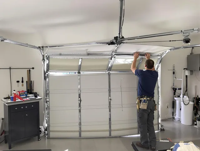 Pasadena Garage Door Repair specialist performing precise section replacement on Pasadena garage door